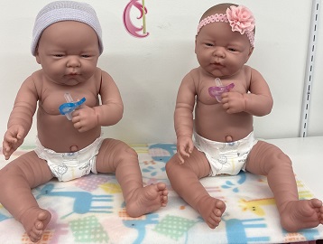 baby dolls with pacifiers